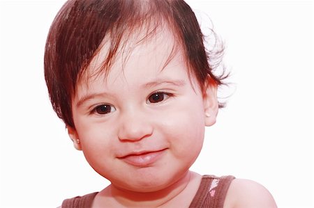 little child baby smiling closeup portrait on white background Stock Photo - Budget Royalty-Free & Subscription, Code: 400-05334906