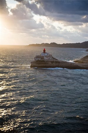 simsearch:400-04272525,k - Red lighthouse on rocks in Bonifacio, Corsica, France Stock Photo - Budget Royalty-Free & Subscription, Code: 400-05334968