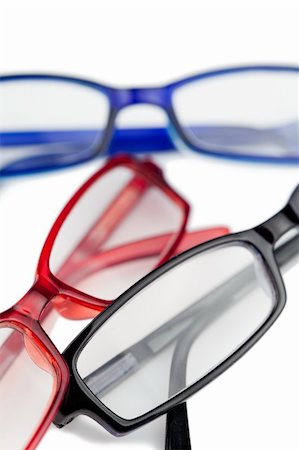 simsearch:400-07774329,k - Three pairs of glasses with blue red and black frames on a white background Stock Photo - Budget Royalty-Free & Subscription, Code: 400-05335149