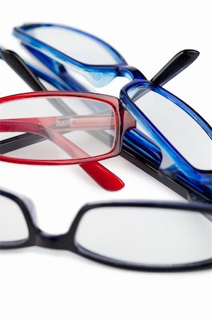 simsearch:400-07774329,k - Three pairs of glasses with blue black and red frames on a white background Stock Photo - Budget Royalty-Free & Subscription, Code: 400-05335151
