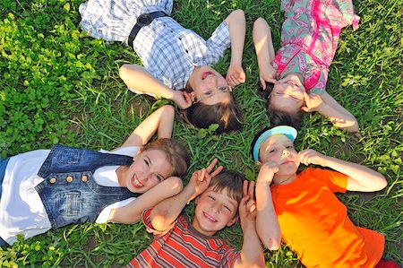 simsearch:400-05381058,k - children laying together on ground Stock Photo - Budget Royalty-Free & Subscription, Code: 400-05335673