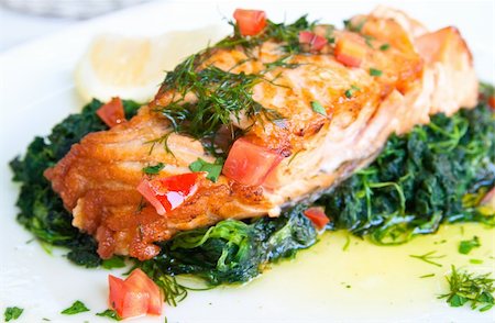 grilled salmon and lemon - french cuisine dish with tomato and salmon Stock Photo - Budget Royalty-Free & Subscription, Code: 400-05336536