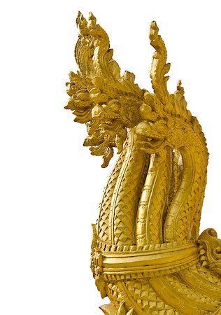 Head of golden Naga in isolation Stock Photo - Budget Royalty-Free & Subscription, Code: 400-05339625