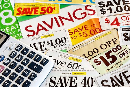 Calculate how much we save by clipping coupons Stock Photo - Budget Royalty-Free & Subscription, Code: 400-05339653