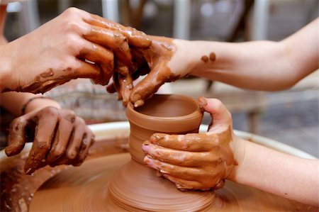 simsearch:400-07899762,k - clay potter hands wheel pottery work workshop teacher and pupil Stock Photo - Budget Royalty-Free & Subscription, Code: 400-05332009