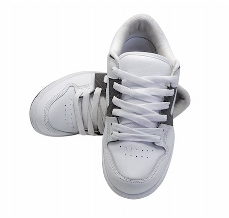 simsearch:400-07922607,k - Pair of white sneakers isolated on white background Stock Photo - Budget Royalty-Free & Subscription, Code: 400-05332609