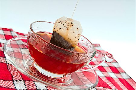 simsearch:400-04273561,k - transparent cup of tea and tea bag Stock Photo - Budget Royalty-Free & Subscription, Code: 400-05344048