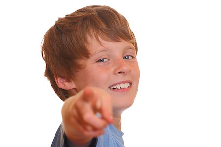 Portrait of a young blond boy pointing with his finger at you Stock Photo - Budget Royalty-Free & Subscription, Code: 400-05344189