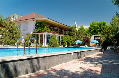 resort pool view - beautiful pool indoor recreation Stock Photo - Budget Royalty-Free & Subscription, Code: 400-05345021