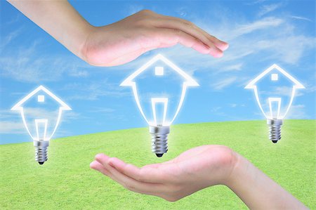 simsearch:400-04265413,k - light bulb model of a house in women hand on sky Stock Photo - Budget Royalty-Free & Subscription, Code: 400-05345767