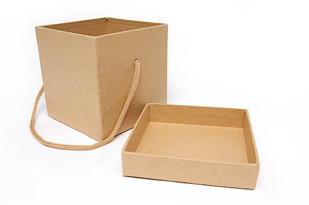 shipping carton - Open craft box on isolated white background Stock Photo - Budget Royalty-Free & Subscription, Code: 400-05346883