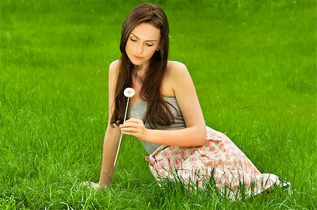 simsearch:400-04399510,k - Girl with dandelion on green field Stock Photo - Budget Royalty-Free & Subscription, Code: 400-05346912