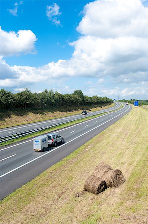 simsearch:400-05112302,k - almost empty highway in vacation time with a few hayrolls aside Stock Photo - Budget Royalty-Free & Subscription, Code: 400-05347996
