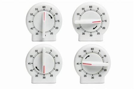 Collection of Kitchen timers showing dial setting at different times on white background Stock Photo - Budget Royalty-Free & Subscription, Code: 400-05348889