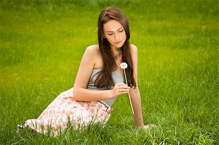 simsearch:400-04399510,k - Girl with dandelion on green field Stock Photo - Budget Royalty-Free & Subscription, Code: 400-05340196