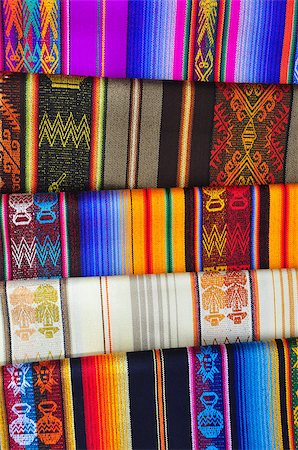ecuador otavalo market - Brightly coloured patterned alpaca blankets on traditional market stall Stock Photo - Budget Royalty-Free & Subscription, Code: 400-05341867