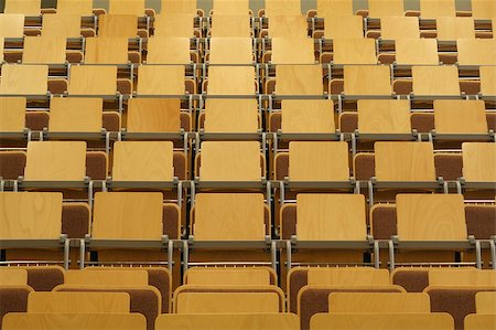 pupil in a empty classroom - empty university class room with wooden seats Stock Photo - Budget Royalty-Free & Subscription, Code: 400-05342616