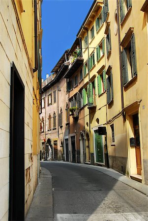 urban view of Verona, Italy, narrow curve street Stock Photo - Budget Royalty-Free & Subscription, Code: 400-05342983