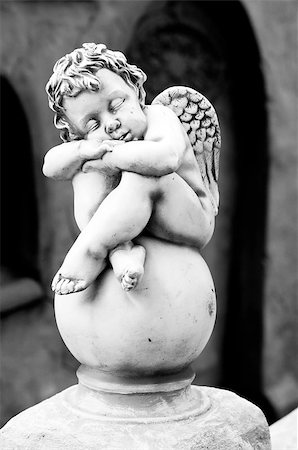 An angel statue sitting on a fountain Stock Photo - Budget Royalty-Free & Subscription, Code: 400-05343973