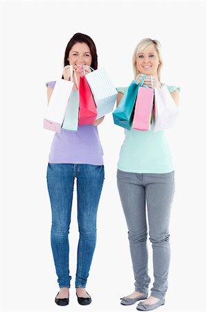 simsearch:400-04904785,k - Charming women with shopping bags in a studio Stock Photo - Budget Royalty-Free & Subscription, Code: 400-05357765