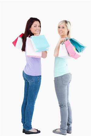 simsearch:400-04904785,k - Gorgeous women with shopping bags in a studio Stock Photo - Budget Royalty-Free & Subscription, Code: 400-05357768