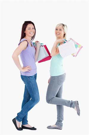 simsearch:400-04904785,k - Joyful women with shopping bags in a studio Stock Photo - Budget Royalty-Free & Subscription, Code: 400-05357770