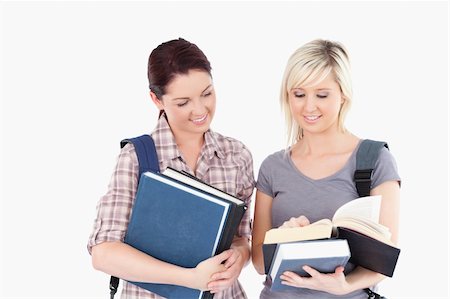 simsearch:400-05357982,k - Two cute female students reading a book Stock Photo - Budget Royalty-Free & Subscription, Code: 400-05357947