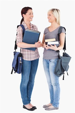 simsearch:400-05357982,k - Charming College students posing in a studio Stock Photo - Budget Royalty-Free & Subscription, Code: 400-05357940