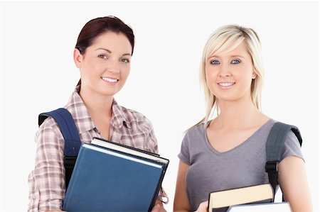 simsearch:400-05357982,k - Close up of College students holding books in a studio Stock Photo - Budget Royalty-Free & Subscription, Code: 400-05357941