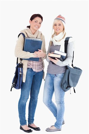 simsearch:400-05357982,k - Two cute female students with books prepared for winter Stock Photo - Budget Royalty-Free & Subscription, Code: 400-05357950