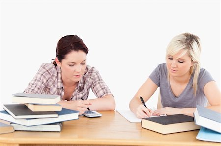 simsearch:400-05357982,k - Two cute female students doing homework Stock Photo - Budget Royalty-Free & Subscription, Code: 400-05357969