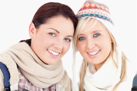 simsearch:400-05357982,k - Two lovely women with heads together looking to camera Stock Photo - Budget Royalty-Free & Subscription, Code: 400-05357962