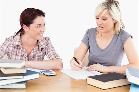 simsearch:400-05357982,k - A cute student is explaining their homework to her friend Stock Photo - Budget Royalty-Free & Subscription, Code: 400-05357980