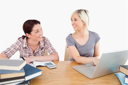 simsearch:400-05357982,k - Two cute women learning at a table Stock Photo - Budget Royalty-Free & Subscription, Code: 400-05358775