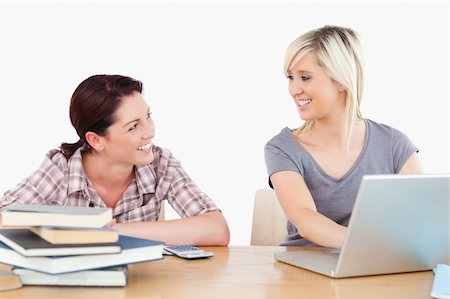 simsearch:400-05357982,k - Two women learning with a laptop and books Stock Photo - Budget Royalty-Free & Subscription, Code: 400-05358778