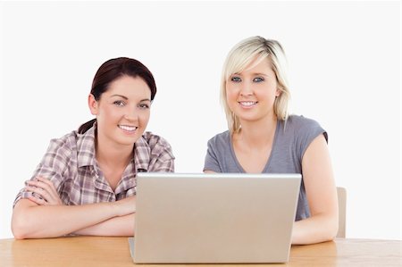 simsearch:400-05357982,k - Two pretty women learning with a laptop Stock Photo - Budget Royalty-Free & Subscription, Code: 400-05358782