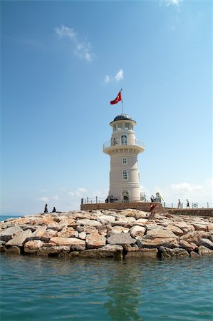 simsearch:400-07405238,k - Lighthouse in port. Turkey, Alanya. Sunny weather Foto de stock - Super Valor sin royalties y Suscripción, Código: 400-05359138