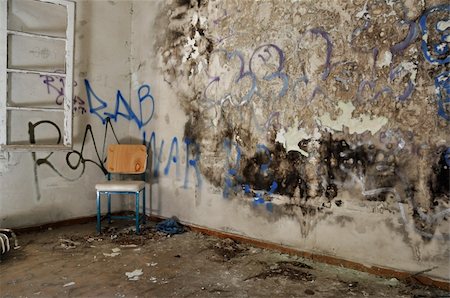 simsearch:859-03983026,k - Chair in decayed room interior. Peeling moldy wall and smudged paint. Stock Photo - Budget Royalty-Free & Subscription, Code: 400-05352398