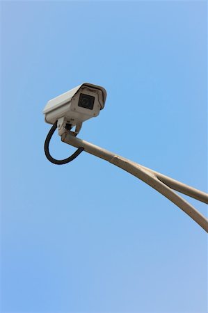 Security camera with blue sky Stock Photo - Budget Royalty-Free & Subscription, Code: 400-05353702