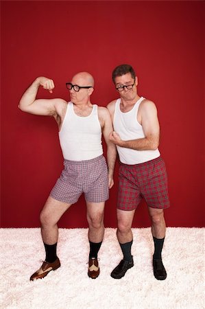 simsearch:400-05372618,k - Two middle-aged men in boxers flex their muscles Stock Photo - Budget Royalty-Free & Subscription, Code: 400-05353766