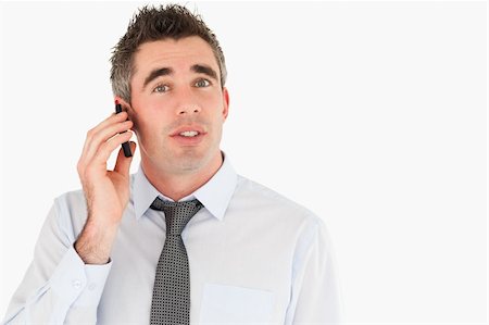 simsearch:400-05145011,k - Office worker making a phone call against a white background Stock Photo - Budget Royalty-Free & Subscription, Code: 400-05353962