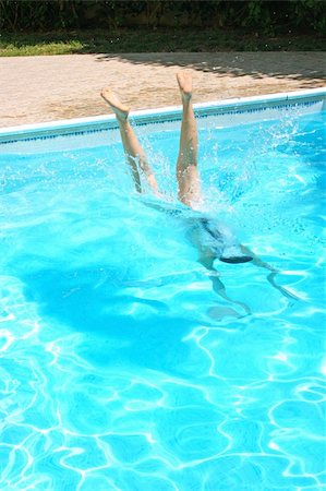 simsearch:400-05381058,k - Pretty woman jumping to swimming pool. Stock Photo - Budget Royalty-Free & Subscription, Code: 400-05366776