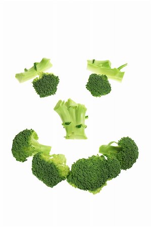 Pieces of Broccoli on White Background Stock Photo - Budget Royalty-Free & Subscription, Code: 400-05366940