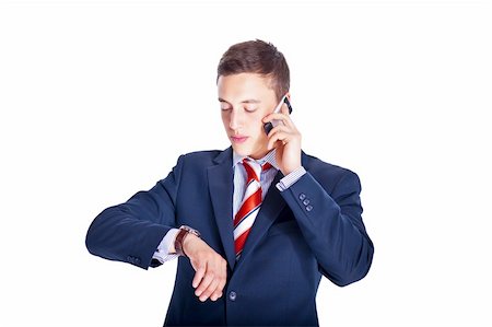 rusloc (artist) - Manager checking time while talking on the phone Stock Photo - Budget Royalty-Free & Subscription, Code: 400-05367223