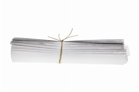 Roll of Newspapers on White Background Stock Photo - Budget Royalty-Free & Subscription, Code: 400-05367401