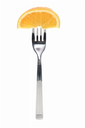 Piece of Orange on Fork with White Background Stock Photo - Budget Royalty-Free & Subscription, Code: 400-05367697