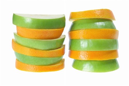 simsearch:400-05367726,k - Slices of Apple and Orange on White Background Stock Photo - Budget Royalty-Free & Subscription, Code: 400-05367700