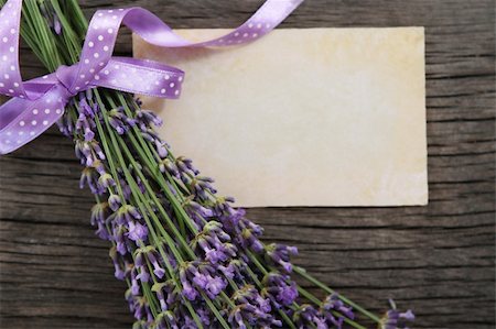 Fresh lavender decorated with ribbon over wooden background Stock Photo - Budget Royalty-Free & Subscription, Code: 400-05367958