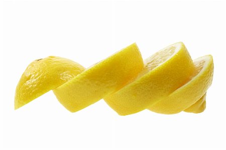 simsearch:400-05367726,k - Slices of Lemon on White Background Stock Photo - Budget Royalty-Free & Subscription, Code: 400-05369238