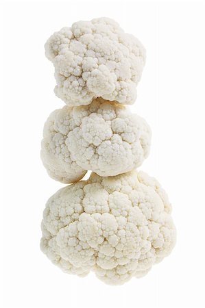 simsearch:400-05744520,k - Stack of cauliflower on White Background Stock Photo - Budget Royalty-Free & Subscription, Code: 400-05369930